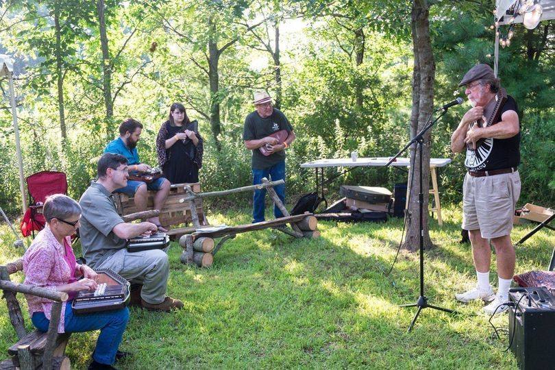 Paul demonstrating autoharps at the Madden Road Music Fest